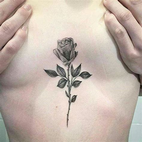 rose tattoo between boobs|Breast Tattoos